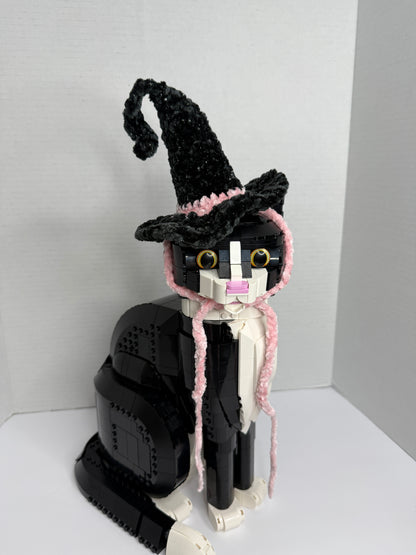 Cat toy with black crochet witch hat