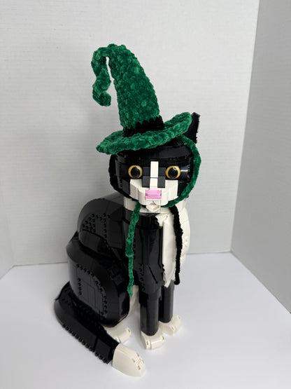 Cat toy with green crochet witch hat