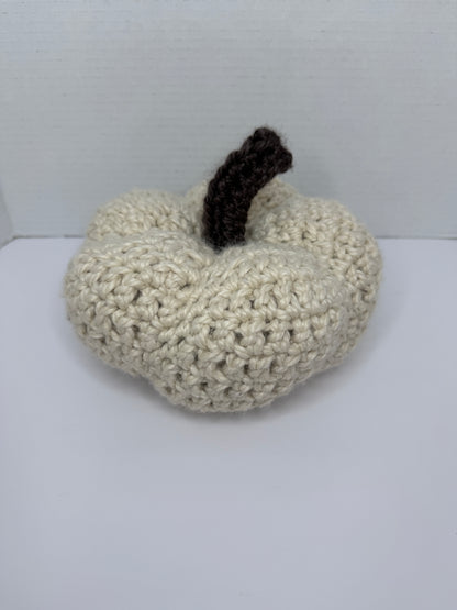 Crochet white pumpkin on a white background